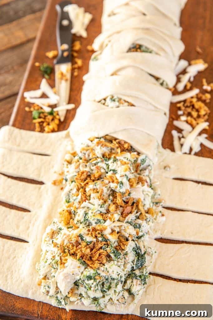Cheesy Monterey Chicken Braid Recipe: Savory Stuffed Bread 3 assembling cheesy chicken and spinach braid