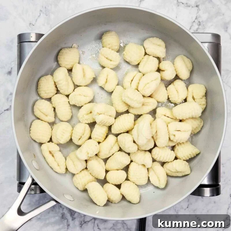 Pan-fry gnocchi until golden.
