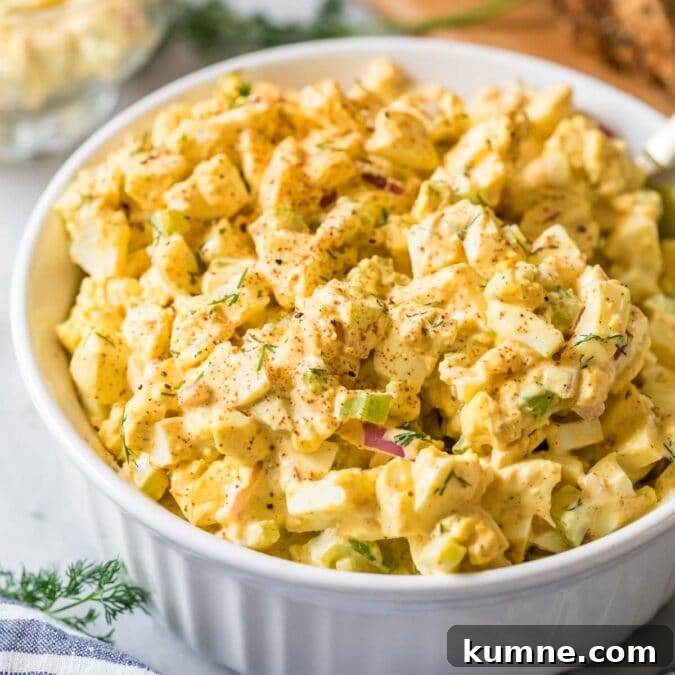 Egg salad in a white serving dish.
