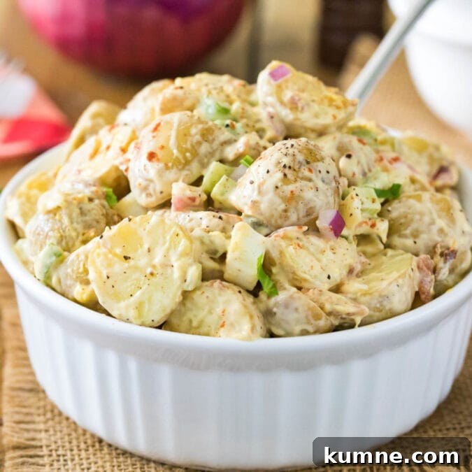 Large serving bowl of potato salad.