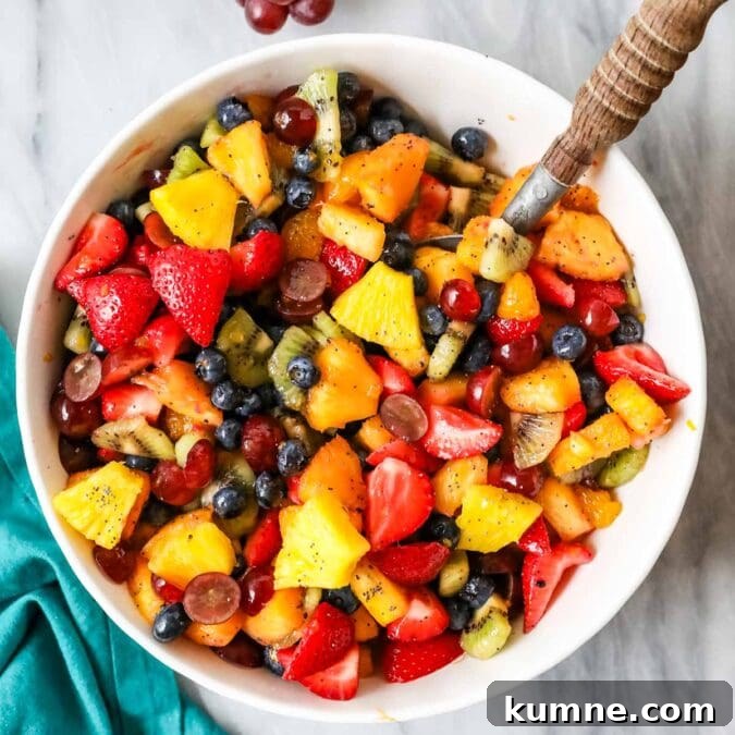 Overhead view of a bowl of fruit salad.