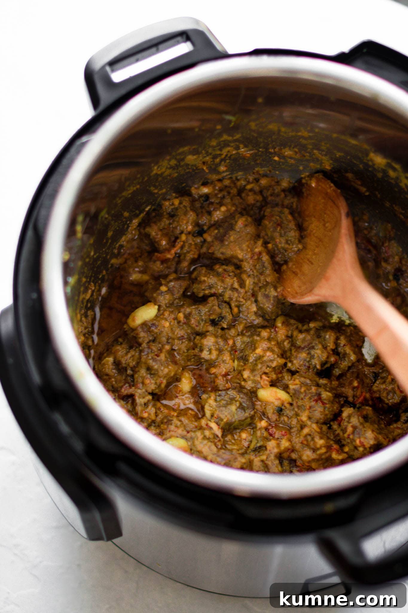 Wooden Spoon in the Instant Pot with beef curry