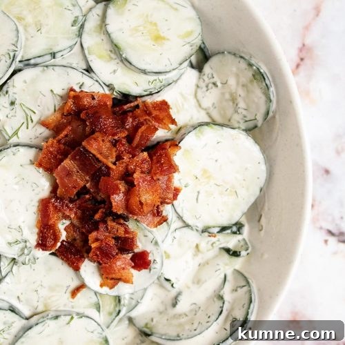 Keto Cucumber and Bacon Salad with Creamy Dill Dressing 15 overhead view of keto cucumber salad with crumbled bacon on top