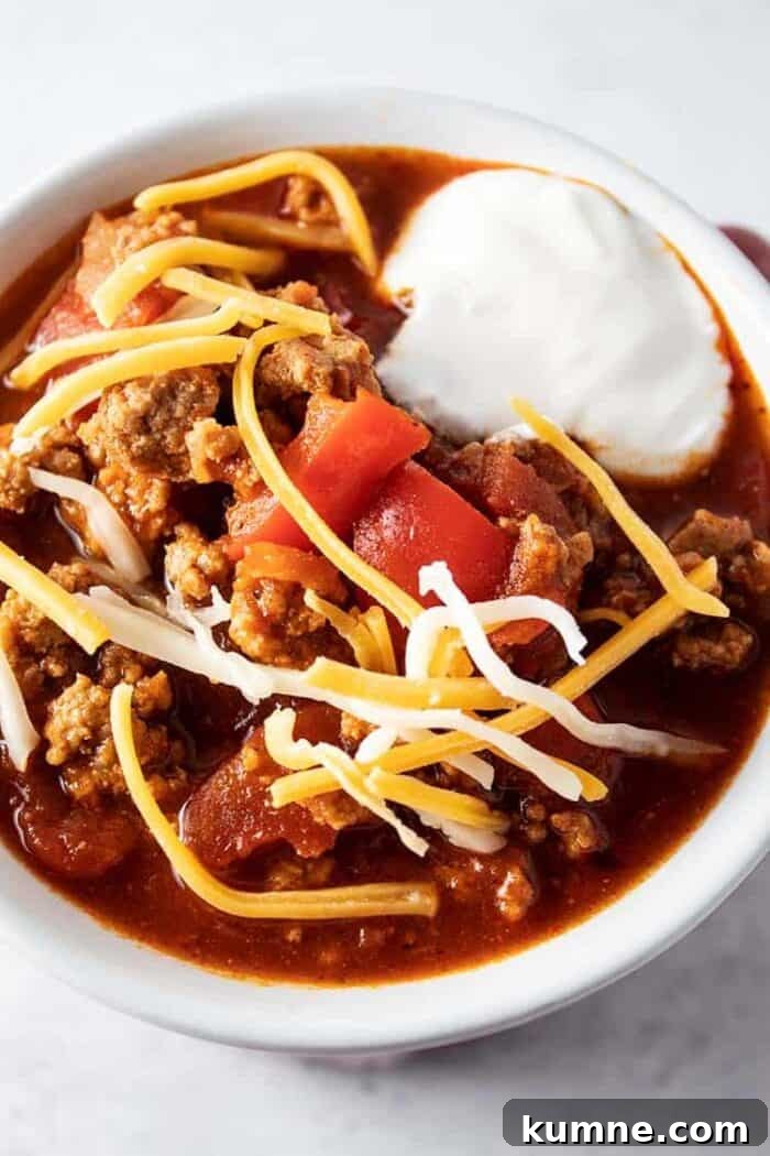 Keto Cucumber and Bacon Salad with Creamy Dill Dressing 22 overhead view of low carb turkey chili with sour cream and cheese on top