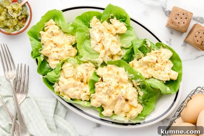 Keto Cucumber and Bacon Salad with Creamy Dill Dressing 9 overhead view of bibb lettuce with keto low carb egg salad inside