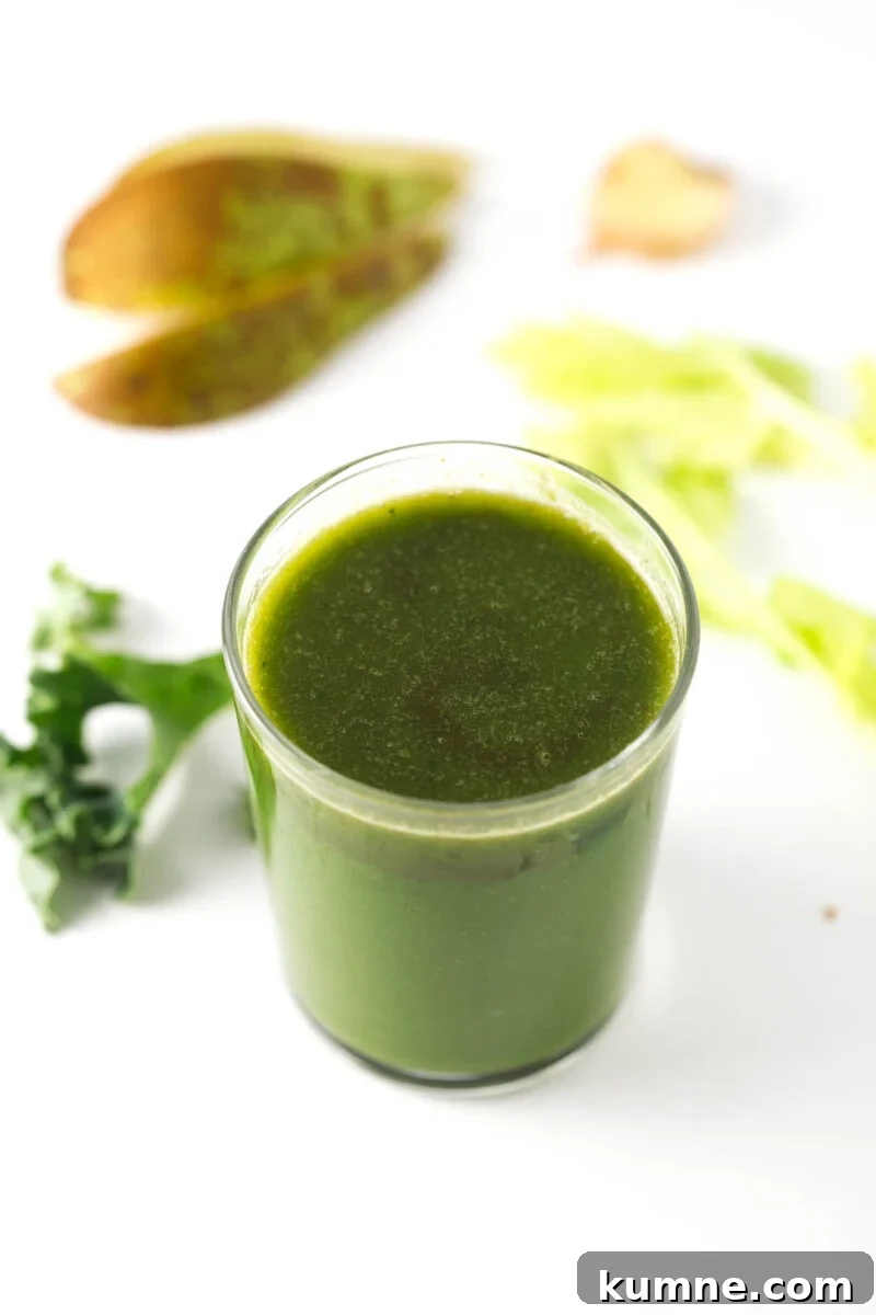 Digestive aid green juice - This green juice is great to improve digestion naturally. It's made with ginger, so is a healthy alternative to coffee in the morning.