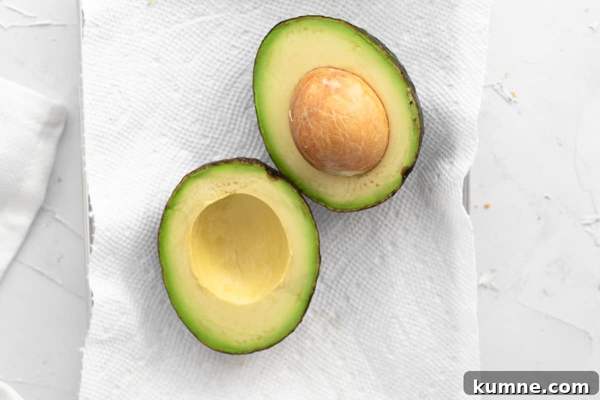 Copycat Dunkin' Avocado Toast Recipe with 3 Ingredients 4 ripe avocado cut in half.
