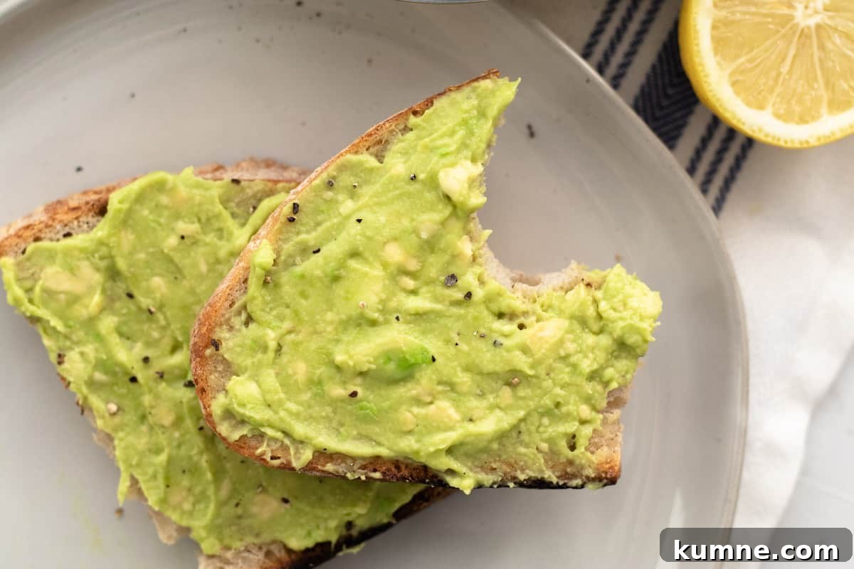 Copycat Dunkin' Avocado Toast Recipe with 3 Ingredients 9 avocado toast with a bite taken out of it