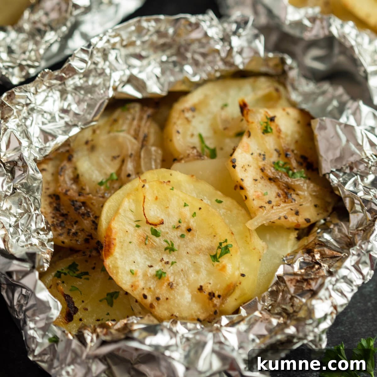 Crispy Foil-Grilled Potatoes with Garlic and Herbs 10 Baked potatoes in foil packets.