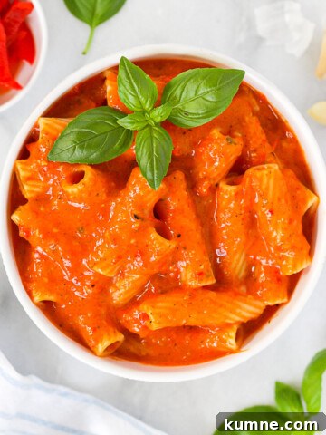 Roasted red pepper sauce on pasta.