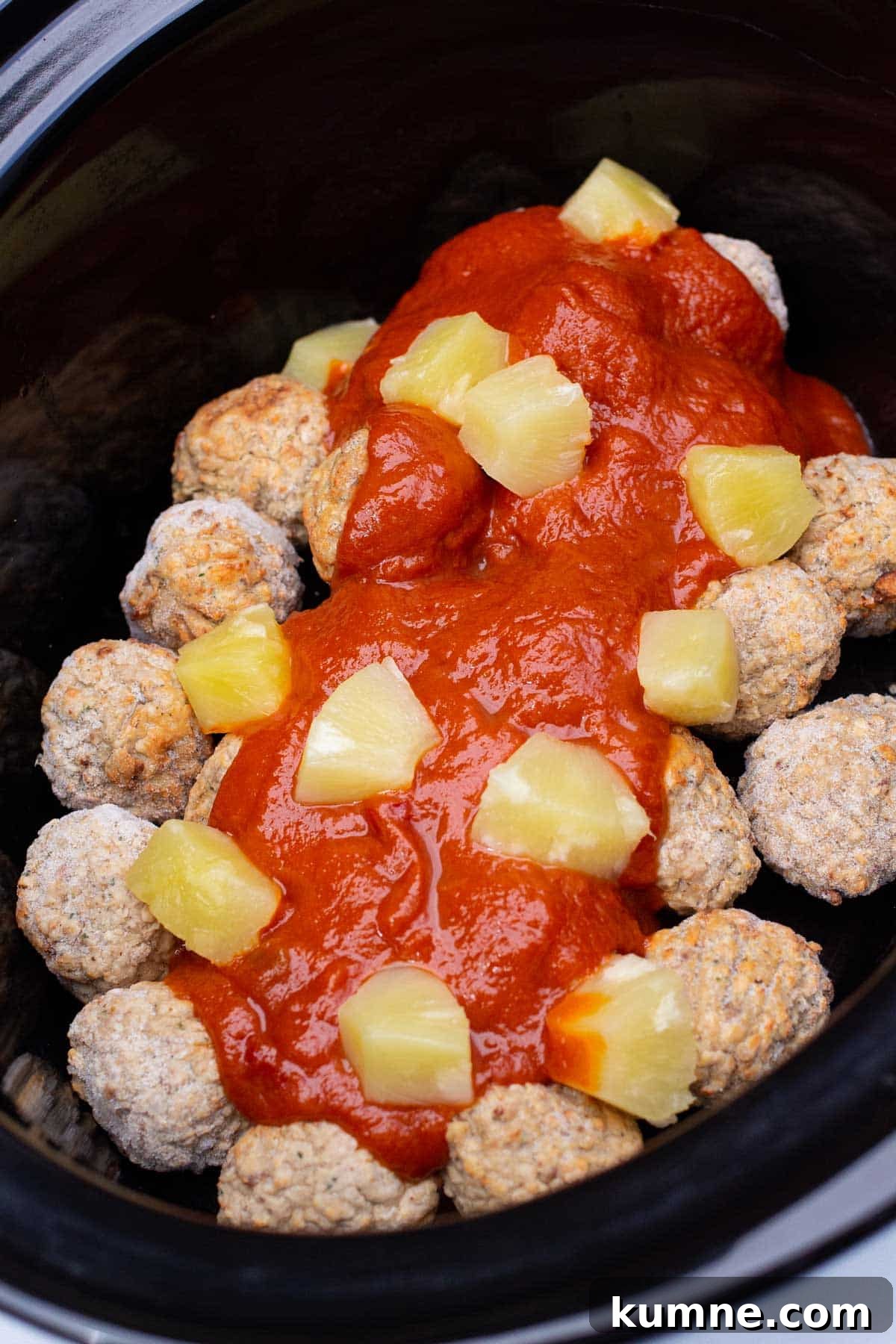 3-Ingredient Hawaiian Meatball Recipe with Pineapple Glaze 4 Frozen meatballs, sloppy joe sauce, and canned pineapple layered in the slow cooker.