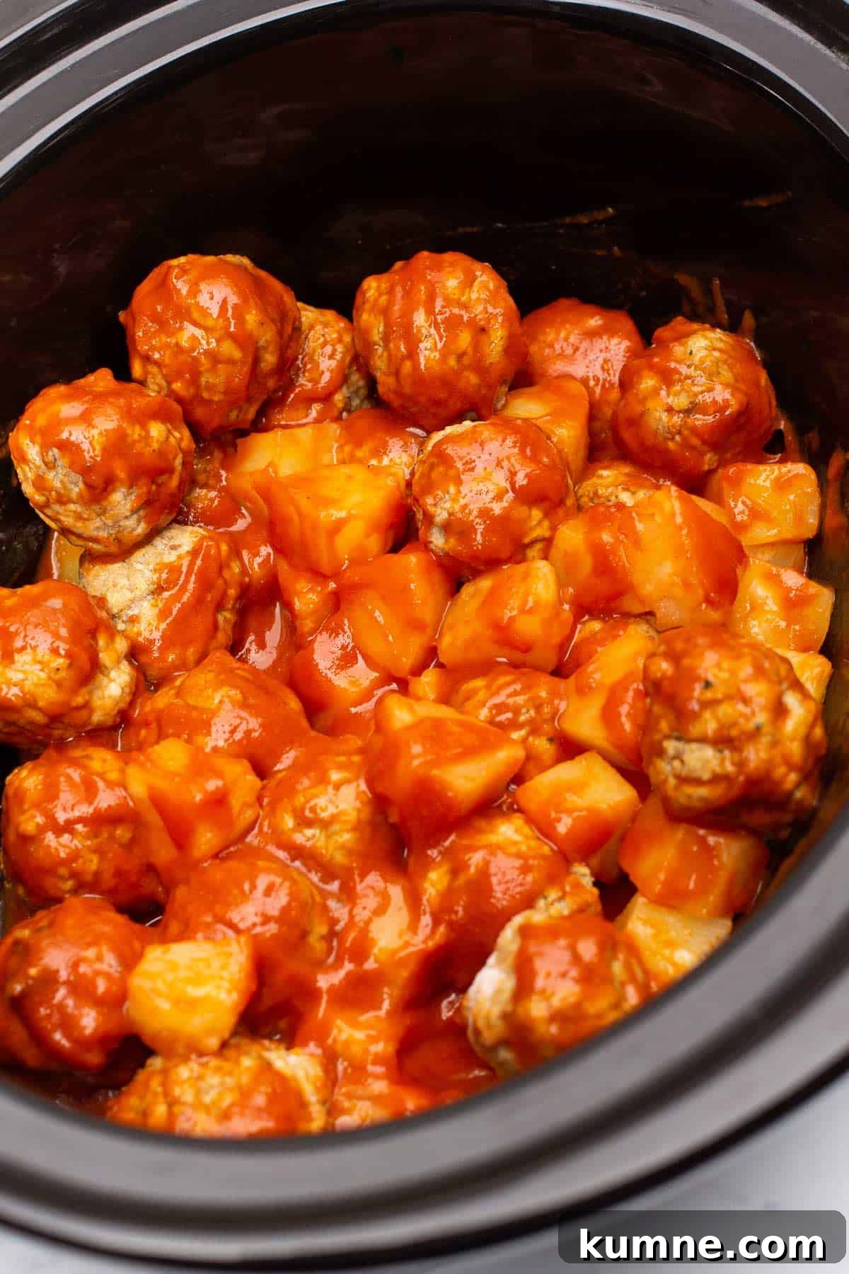 3-Ingredient Hawaiian Meatball Recipe with Pineapple Glaze 5 Frozen meatballs, sloppy joe sauce, and pineapple chunks tossed together in the slow cooker.