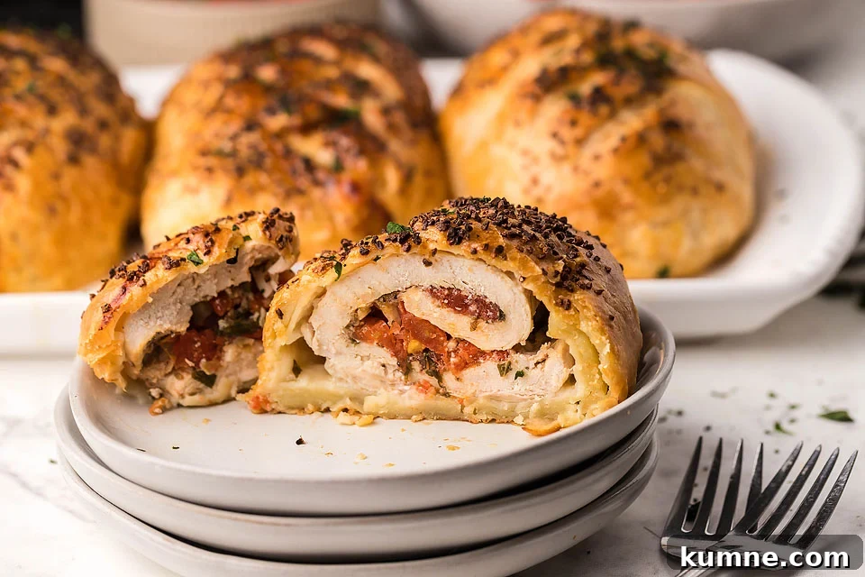 Chicken breasts stuffed with bruschetta on a plate.