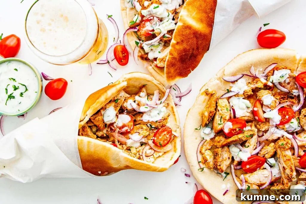 A table with a serving of chicken gyros.