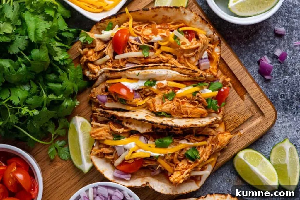 Chicken tacos on a cutting board.