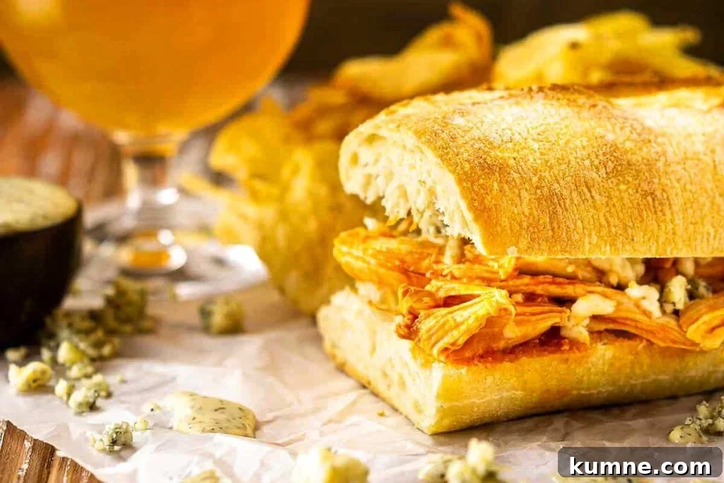 Buffalo chicken sub on a plate.