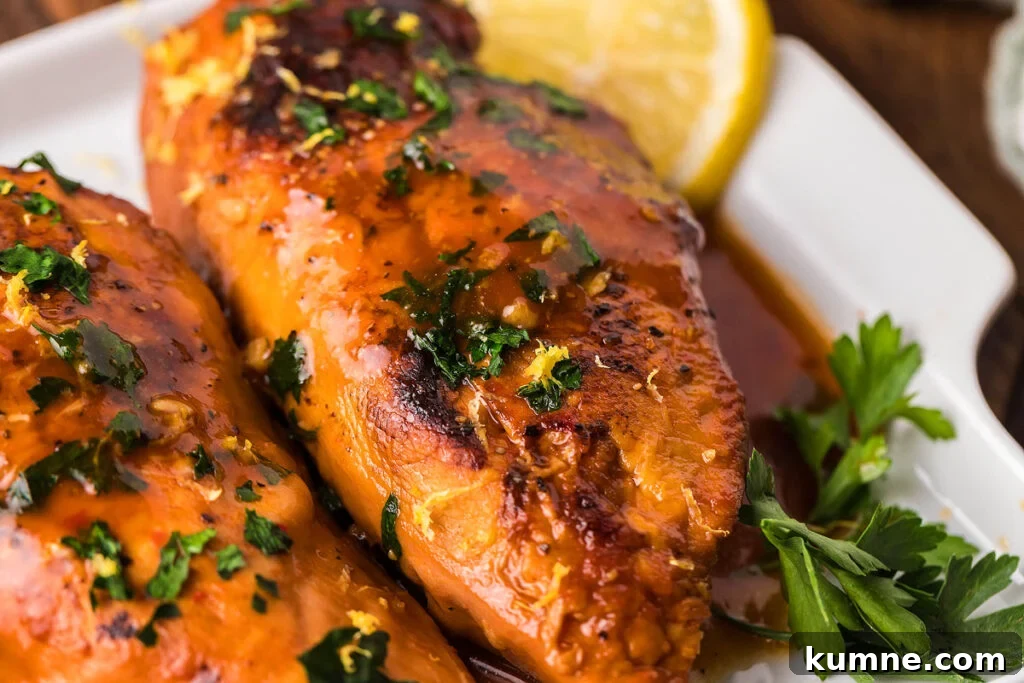 Lemonade chicken breasts on a platter.