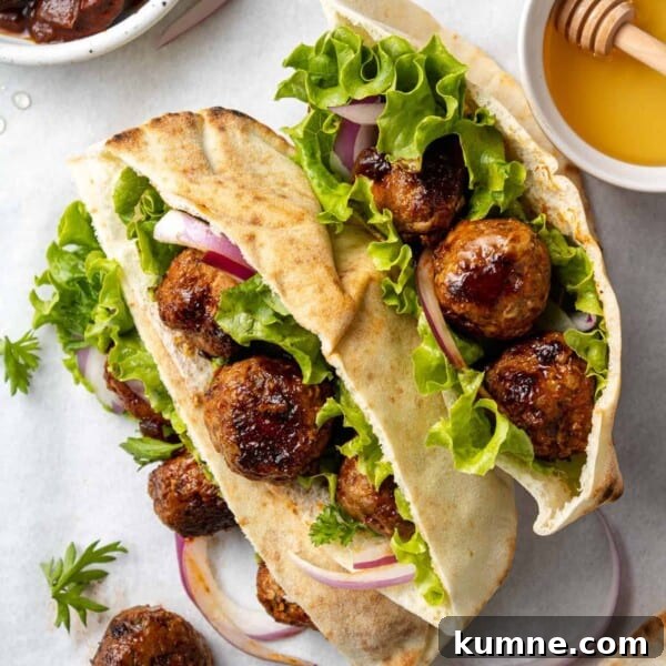 Crispy Air Fryer Italian-Style Meatballs Recipe 15 Chipotle glazed meatballs in two pita halves with lettuce.