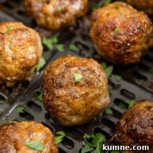 Crispy Air Fryer Italian-Style Meatballs Recipe 17 Air fryer meatballs still in air fryer.