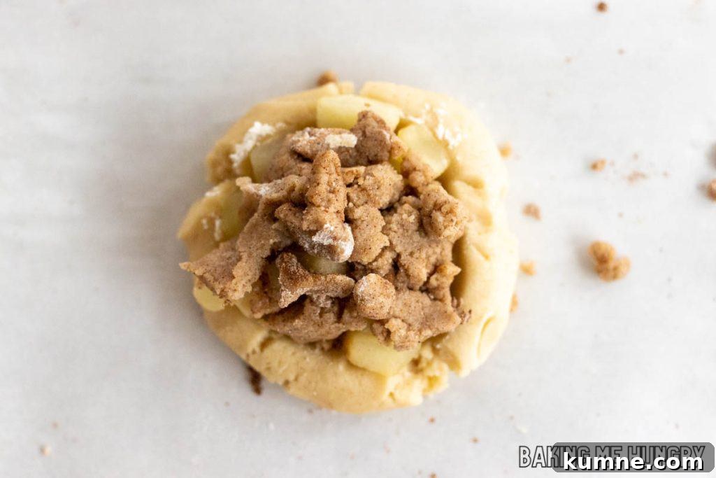Apple Crumble Cookie Recipe — Soft Baked Fall Cookies, Step-by-Step 11 baked cookie on parchment