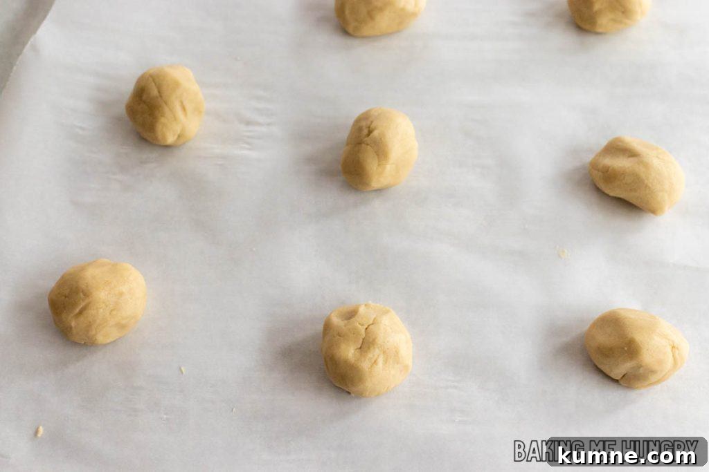 Apple Crumble Cookie Recipe — Soft Baked Fall Cookies, Step-by-Step 7 balls of dough on parchment