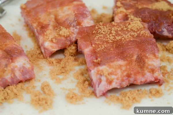 This image shows brown sugar on baby back ribs.
