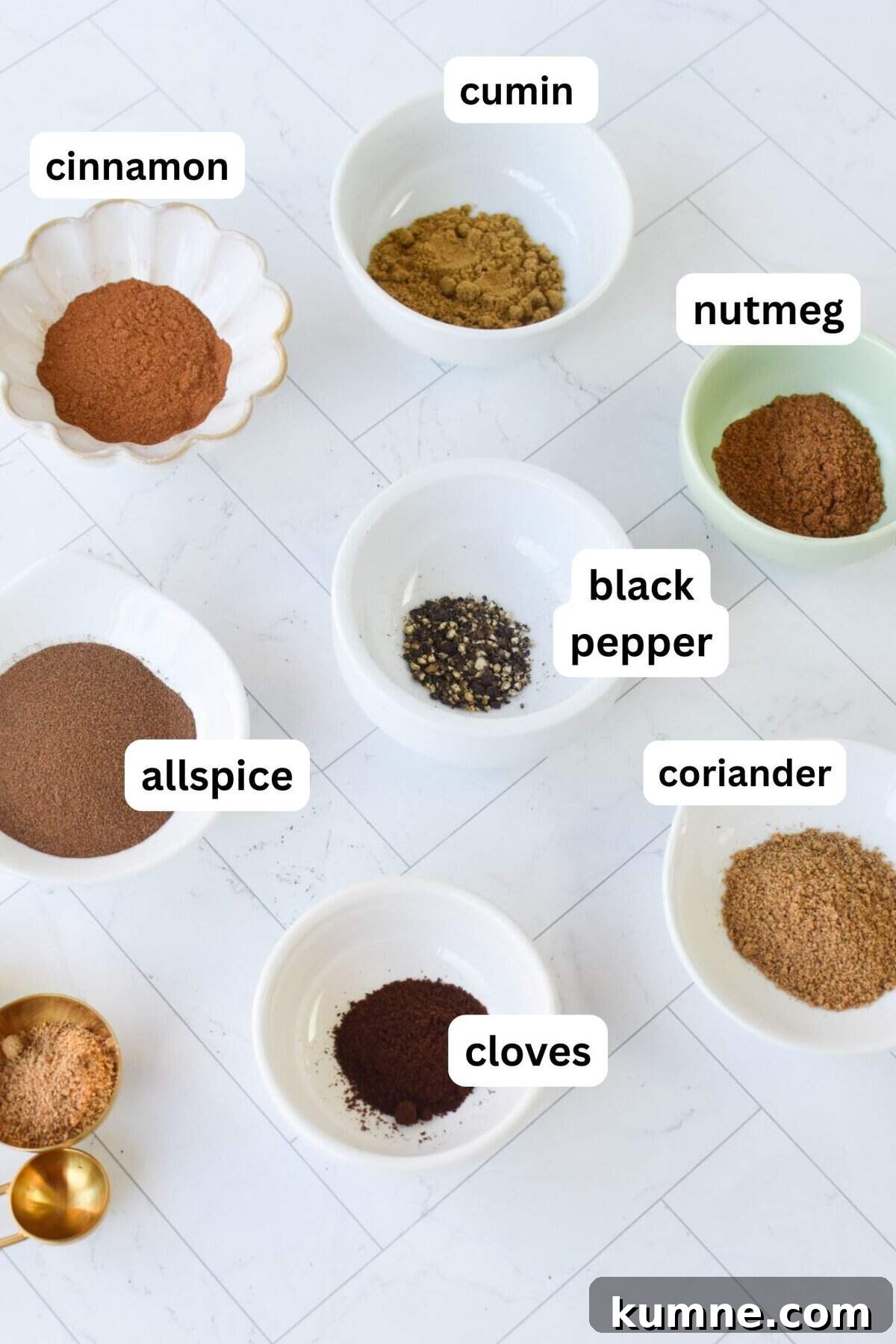 Lebanese 7 Spice Blend with spices in jars 
