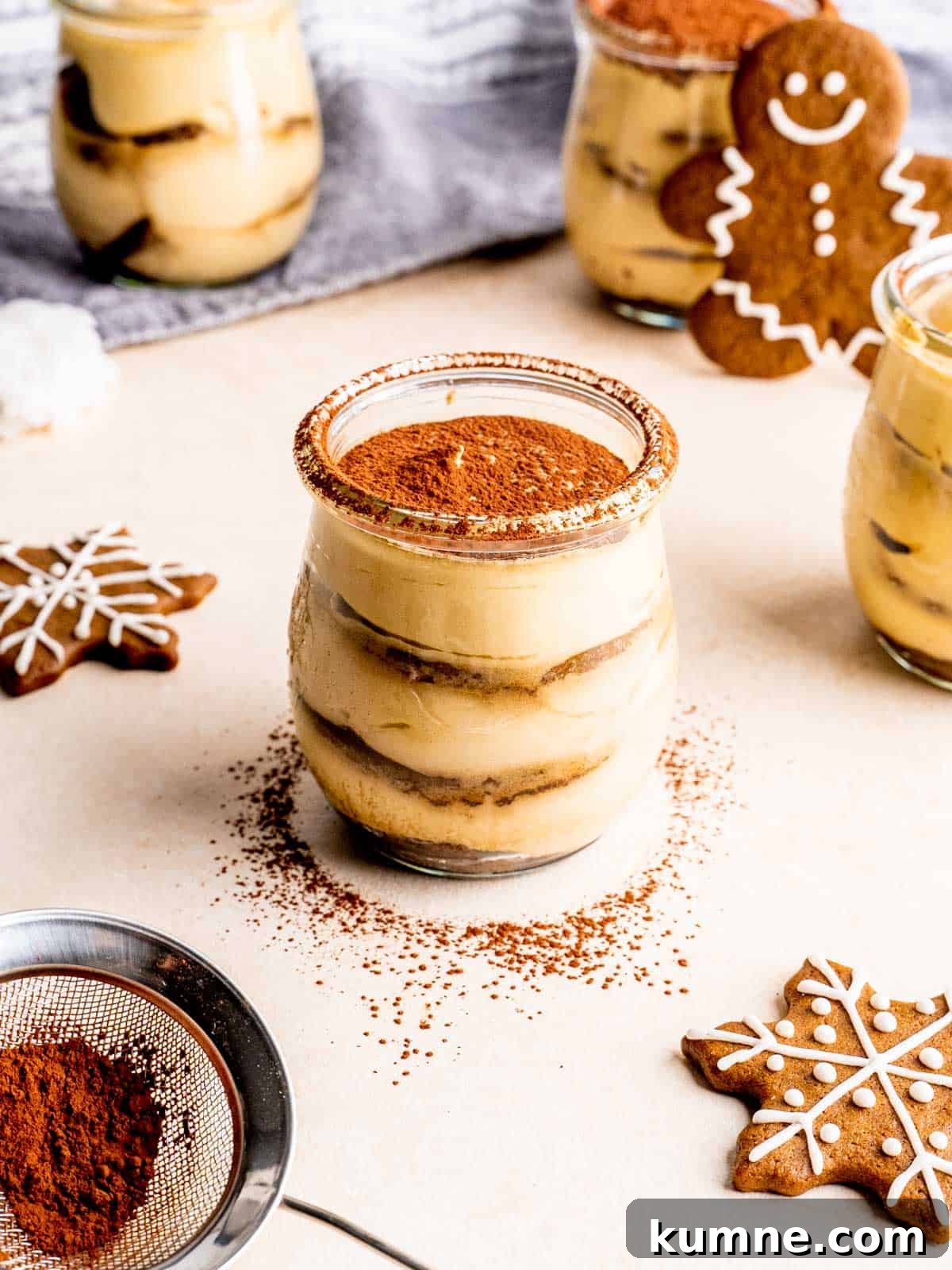 Gingerbread Tiramisu in Jar Recipes for Holiday Desserts 2 A jar of gingerbread tiramisu with cocoa sprinkled on top