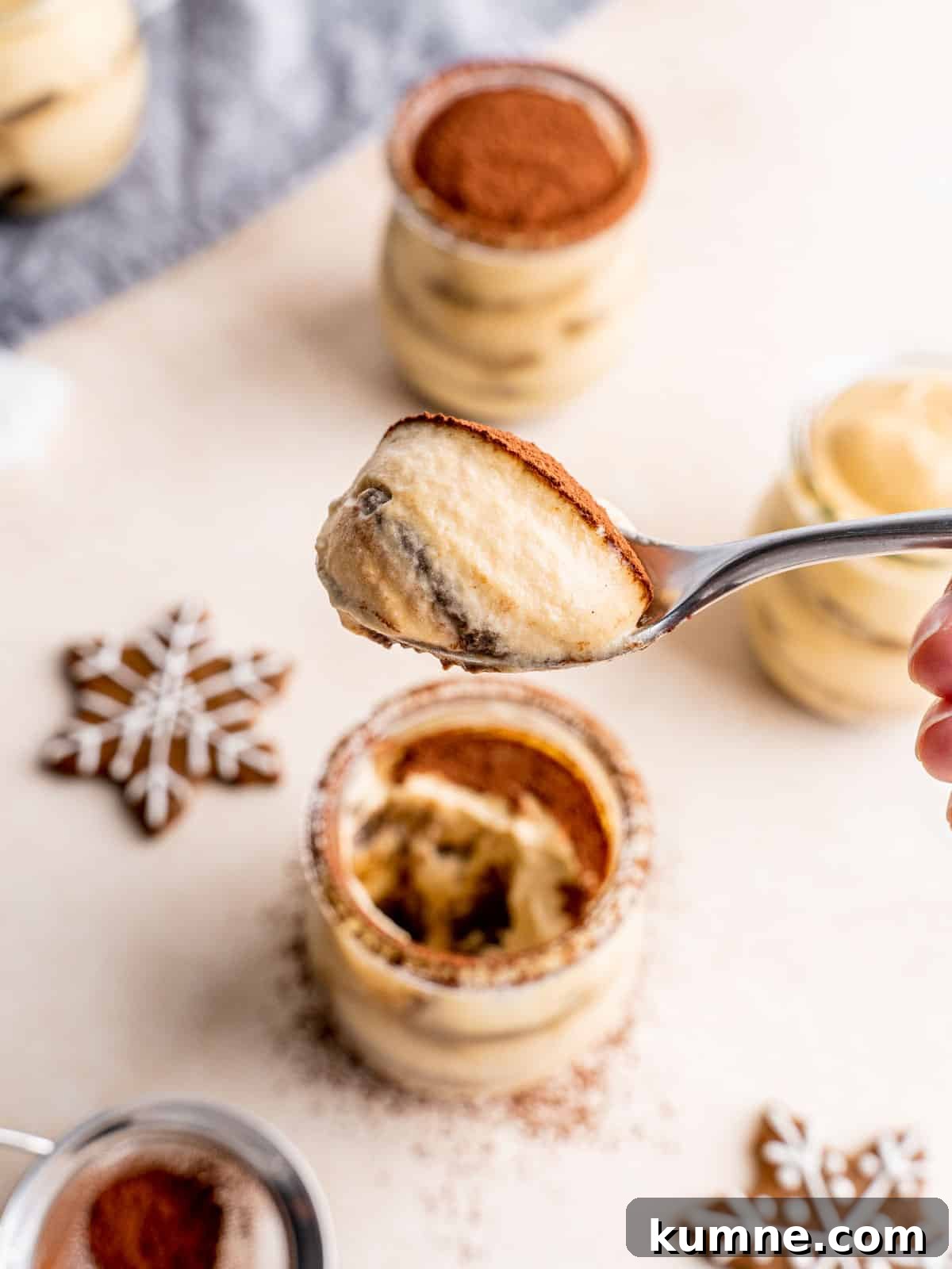 Gingerbread Tiramisu in Jar Recipes for Holiday Desserts 6 A bite of gingerbread tiramisu on a spoon