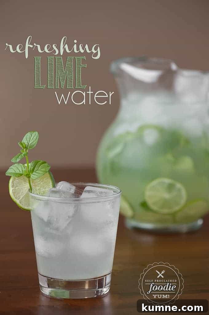 glass and pitcher of water with lime and mint