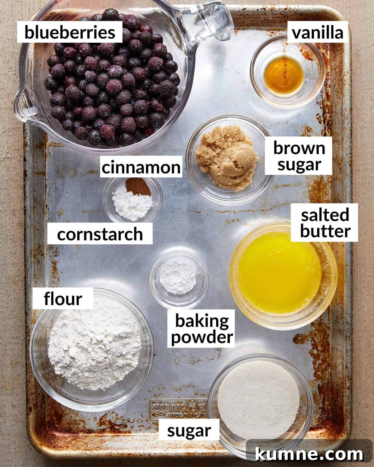 Overhead ingredients needed to make air fryer blueberry cobbler.