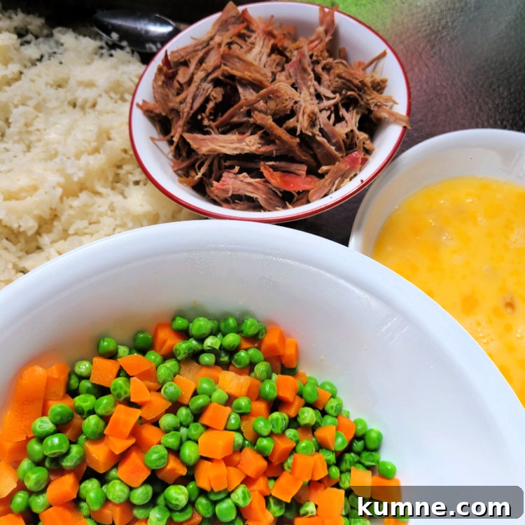 Ingredients for Shredded Pork Fried Rice In Bowls before going on Blackstone Griddle