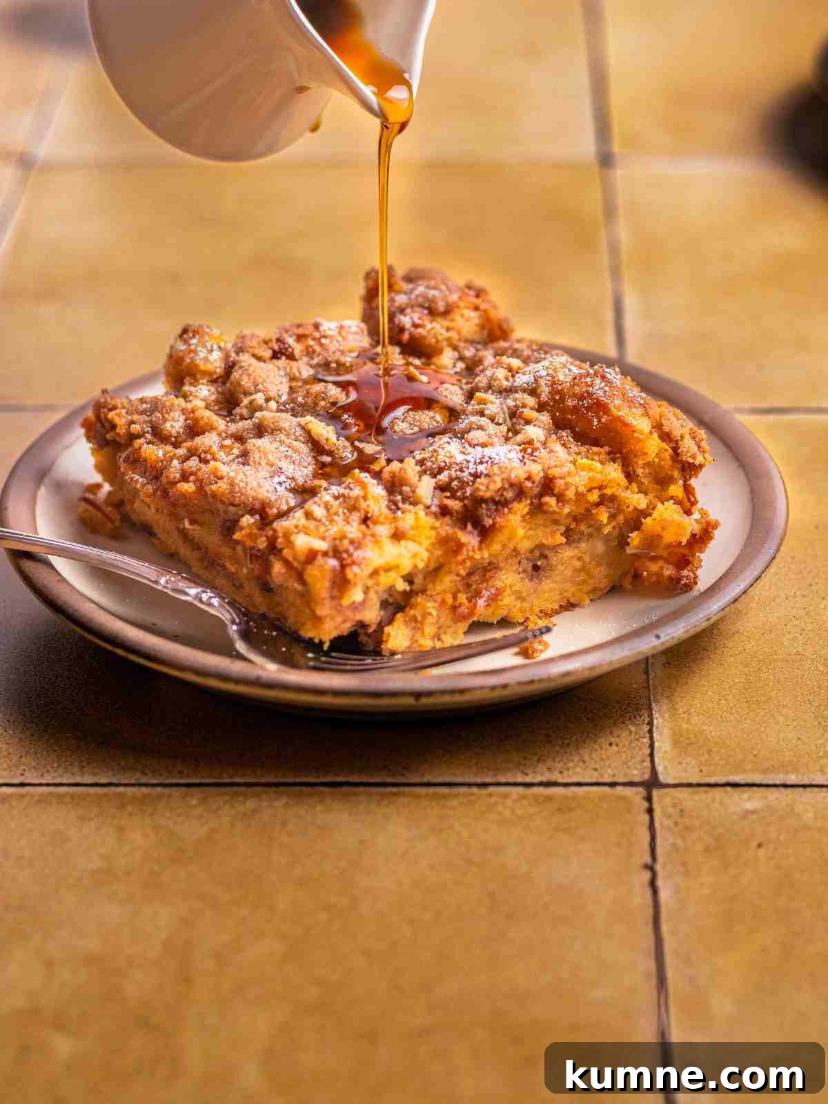 drizzling maple syrup over toast.